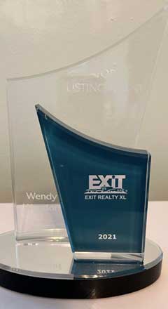 Exit Realty XL Listing Agent Of The Year 2021 trophy